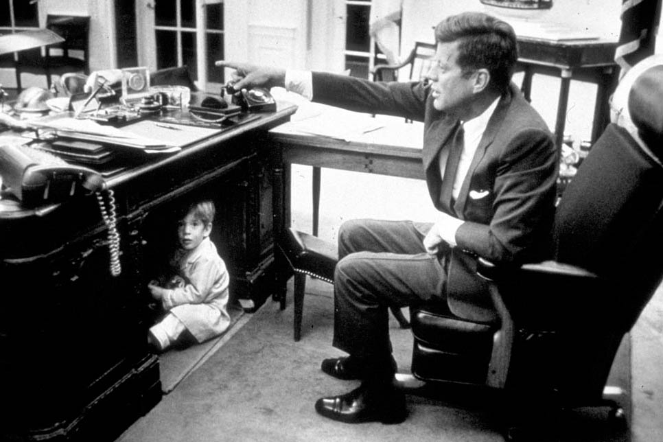 John F. Kennedy and John Jr. in the White House. Photograph by Liaison Agency, 1963.